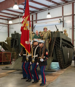 Amphibious Assault Tank with Marines carrying Flag