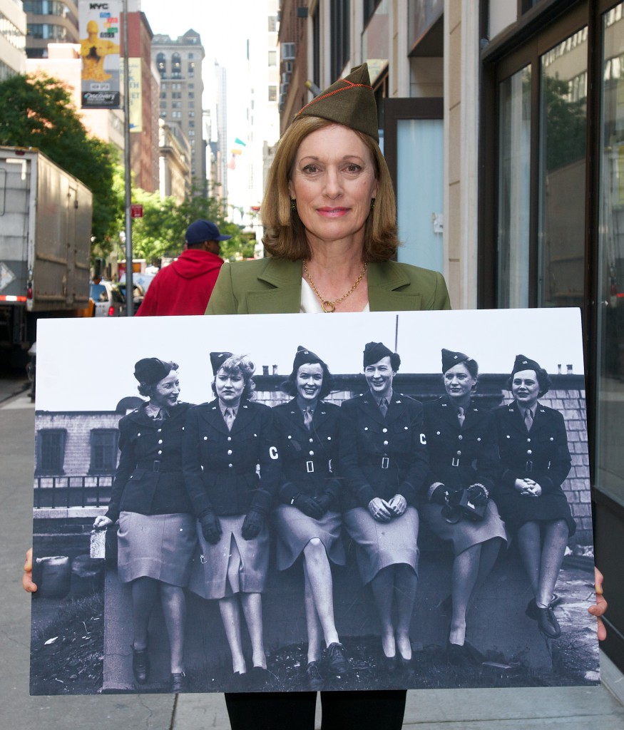 Dr. Libby O’Connell, Chief Historian at the History Channel with a photo of WWII women war correspondents
