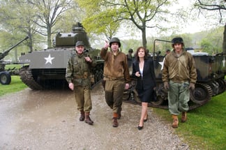 The armor museum’s Eileen Daly-Sapraicone joins WWII living historians during the “field exercises” at Old Bethpage Village Restoration.