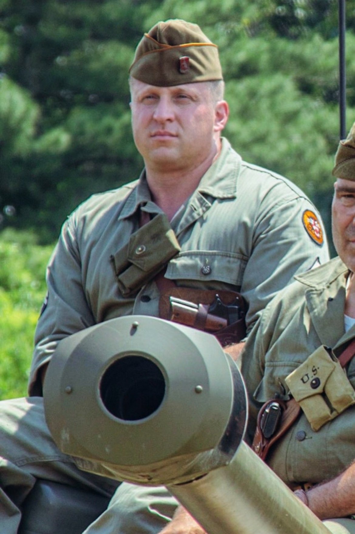 Mark Wilson in uniform on tank